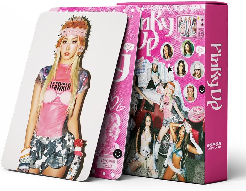 Fan photocards spread on a white surface